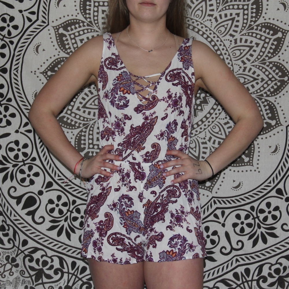 white and purple patterned romper